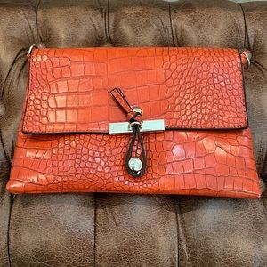 Orange/rust textured clutch or crossbody purse. **NEW**